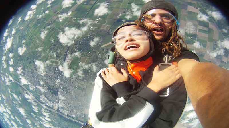 13,000 ft skydive with breathtaking mountain and sea views.