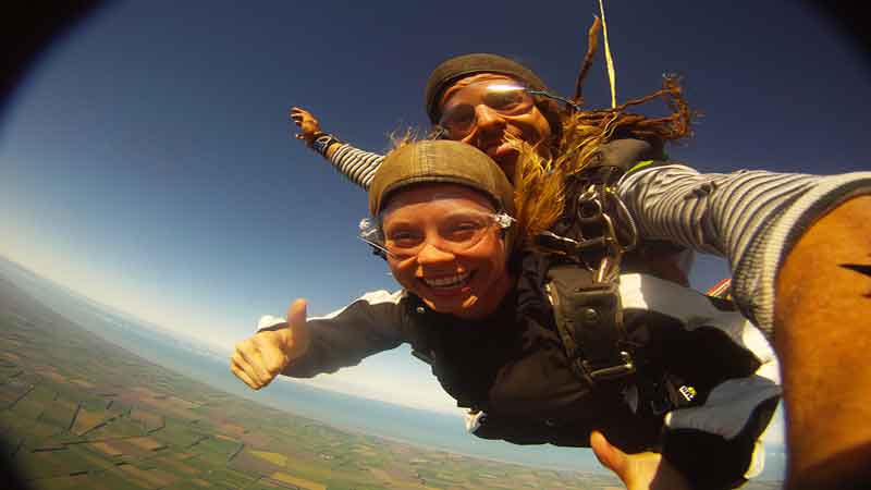 13,000 ft skydive with breathtaking mountain and sea views.