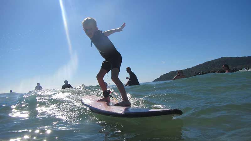 Learn to surf with our skilled team of surf coaches including former world champion Merrick Davies! WE WILL GET YOU STANDING UP ON THE FIRST LESSON!
