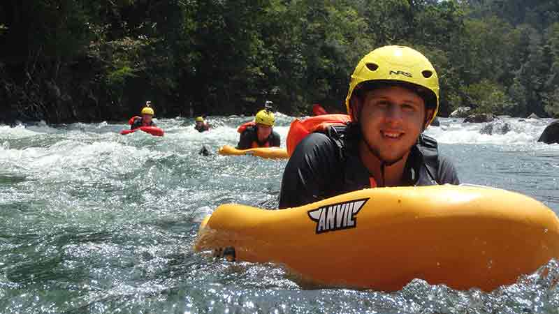 River board the Tully River on up to grade 3 rapids at face level!