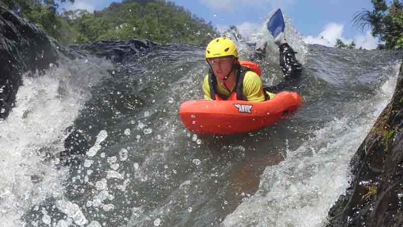 River board the Tully River on up to grade 3 rapids at face level!