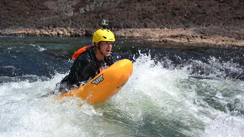 River board the Tully River on up to grade 3 rapids at face level!