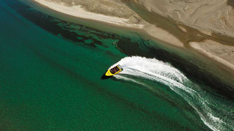 Step off Queenstown's Main Town Pier and onto a big yellow KJet boat for an unforgettable Jet boating experience...
