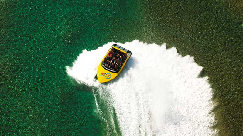 Step off Queenstown's Main Town Pier and onto a big yellow KJet boat for an unforgettable Jet boating experience...