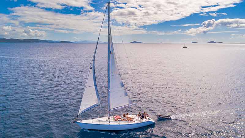 Whitsundays and Fraser Island package deal. Whitsundays sailing aboard smaller capacity boat of 14 people, plus a 2 day 1 night comfort tag along tour
