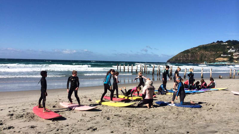 Esplanade Surf School, based on the popular surf beach St Clair, are your number one choice for surfing lessons in Dunedin. Our instructors are friendly, qualified and above all we love to surf!