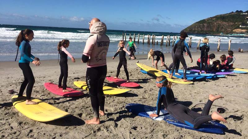 Esplanade Surf School, based on the popular surf beach St Clair, are your number one choice for surfing lessons in Dunedin. Our instructors are friendly, qualified and above all we love to surf!