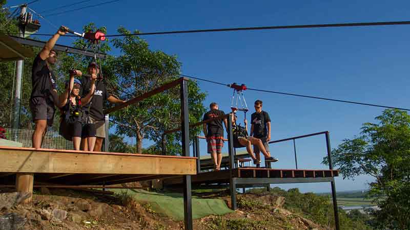 Experience the raw power of gravity and high velocity thrill of zip lining 300 metres (985 ft) over the rainforest in Cairns!