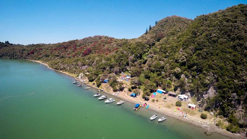 Join Lake Tarawera Ecotours for a fascinating tour by water taxi to Hot Water Beach & experience an extraordinary natural bush hot pool!