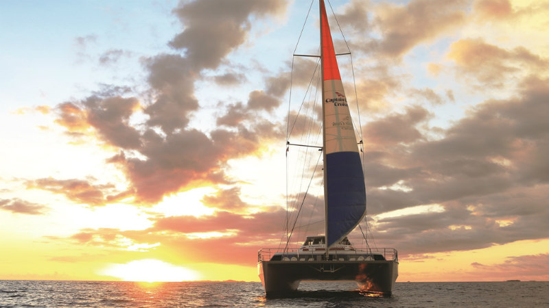 Set sail into a stunning Fijian sunset for the ultimate dining experience.