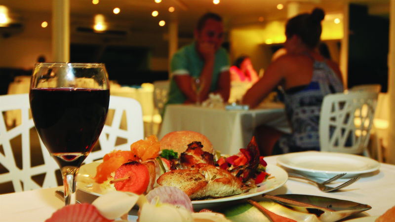 Set sail into a stunning Fijian sunset for the ultimate dining experience.