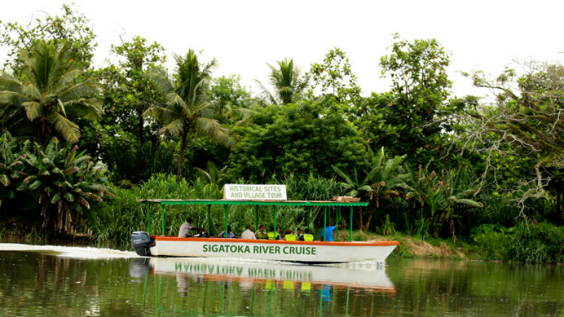 Get a taste of real Fiji village life with a cruise on the Sigatoka River.