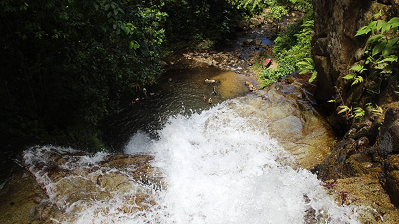 Immerse yourself in a tropical waterfall as you explore the Fiji jungle.