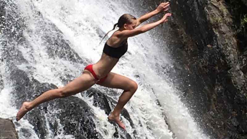 Explore the Rainforest and local waterfall on this half day biking and hiking adventure in Port Douglas