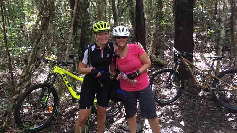 Explore the Rainforest and local waterfall on this half day biking and hiking adventure in Port Douglas