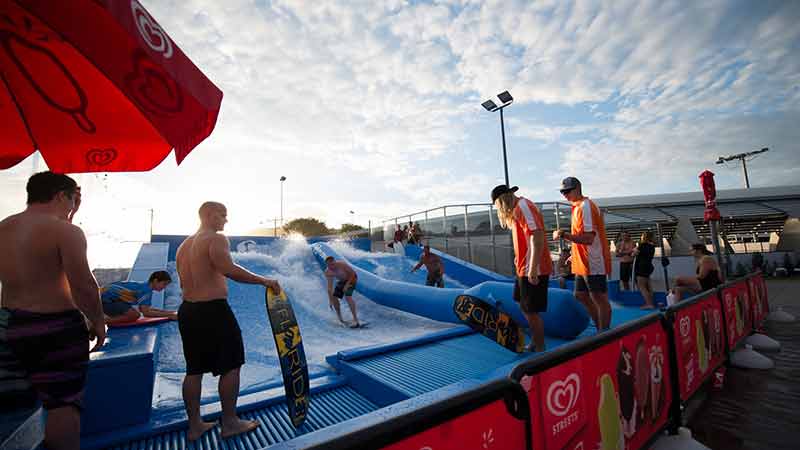 Put your board riding skills to test on the Tobruk Flow Rider in Cairns and experience endless surfing fun! No stingers or crocs, just pure wave action