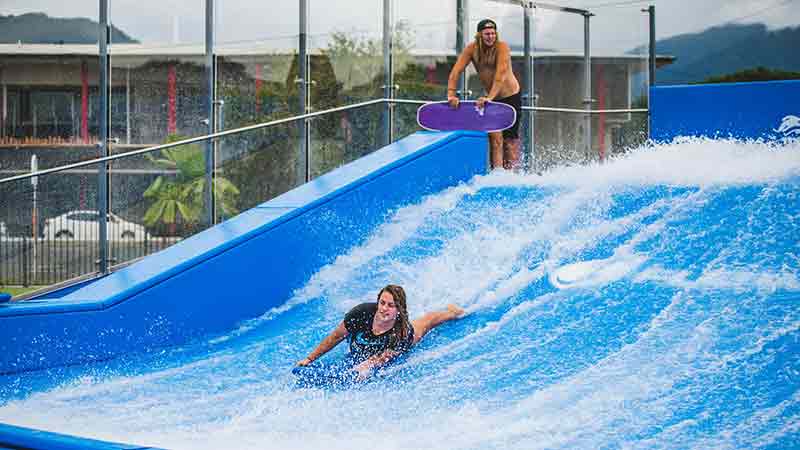 Put your board riding skills to test on the Tobruk Flow Rider in Cairns and experience endless surfing fun! No stingers or crocs, just pure wave action