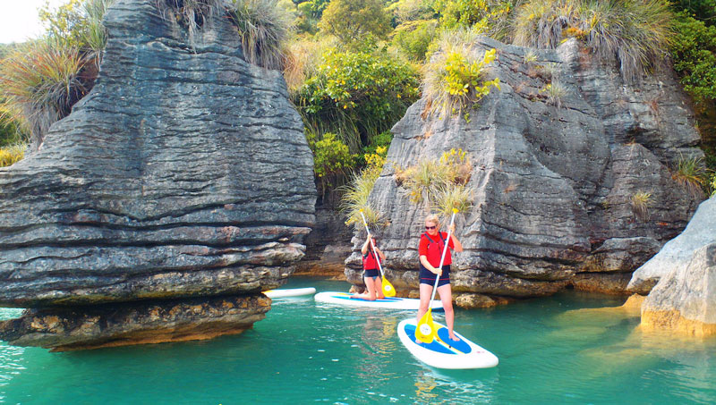 Discover a new way of getting around on the water with Raglan Watersports - Stand Up Paddle Boarding on the Waikato River.