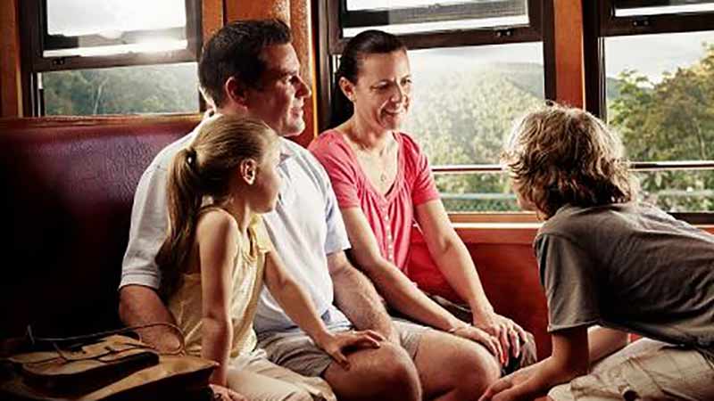 Visit Kuranda village via Kuranda Scenic Railway and  Kuranda Skyrail Cableway from Cairns