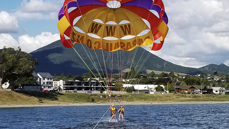 Experience the thrill of soaring to new heights with Taupo Parasail, where you can live in the excitement and take in the stunning scenery while gracefully gliding above the waters of Lake Taupo.