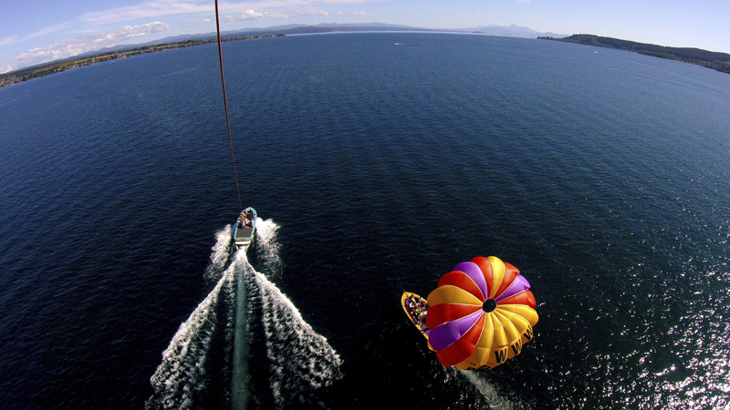 Experience the thrill of soaring to new heights with Taupo Parasail, where you can live in the excitement and take in the stunning scenery while gracefully gliding above the waters of Lake Taupo.