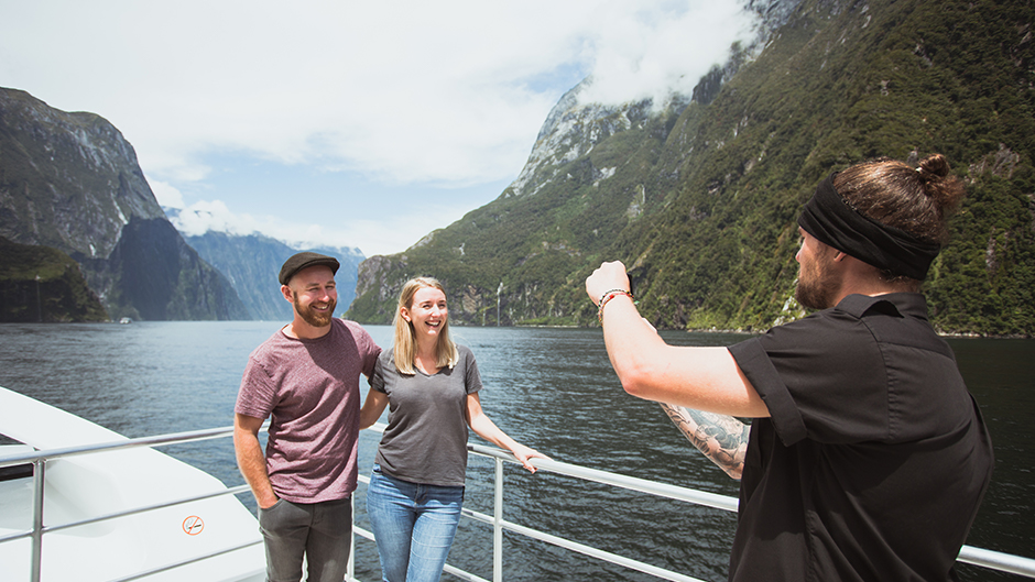 JUCY Cruise and their jovial crew welcome you aboard Milford Sound's only glass roof catamaran for an atmospheric cruise in magical Milford Sound!