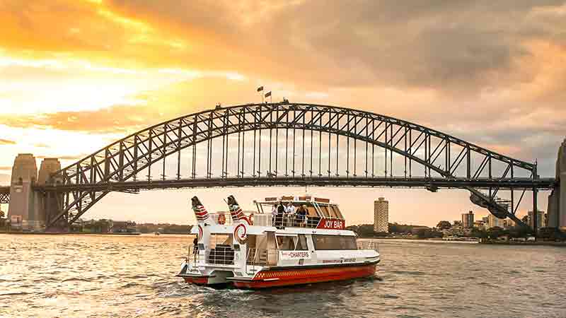 Soak up the beauty of Sydney’s iconic landmarks at twilight on board the luxury boat “Barangaroo"...