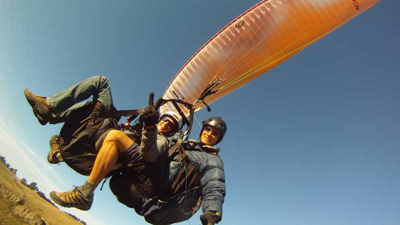 Experience the exciting sport of tandem paragliding overlooking Christchurch.