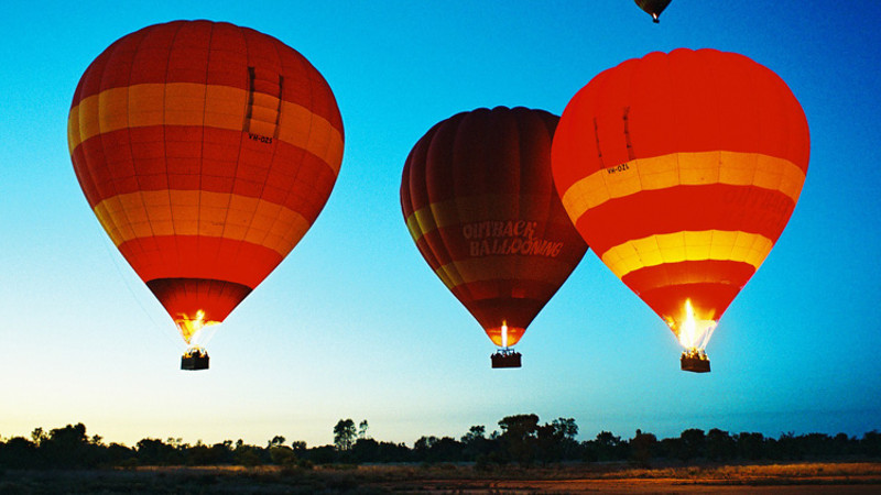 Experience the breathtaking Hot Air Ballooning experience, floating silently above Australia's iconic Northern Territory!