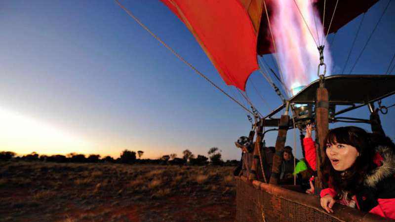 Experience the breathtaking Hot Air Ballooning experience, floating silently above Australia's iconic Northern Territory!