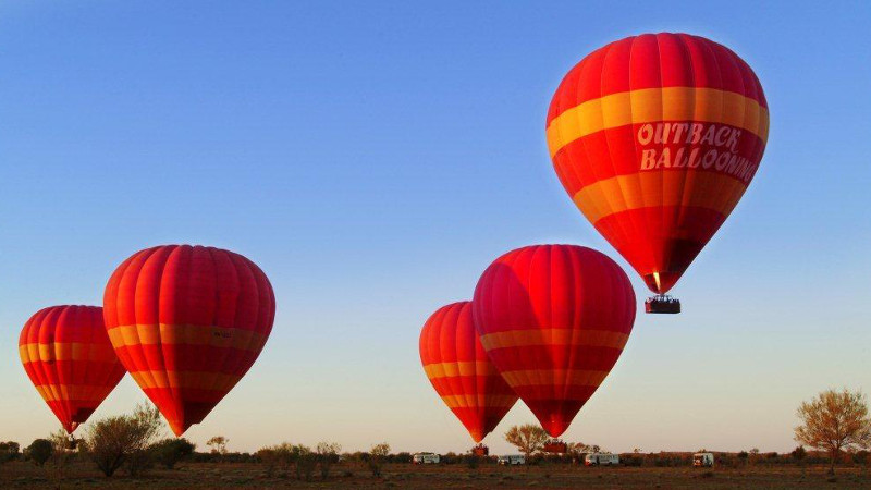 Experience the breathtaking Hot Air Ballooning experience, floating silently above Australia's iconic Northern Territory!