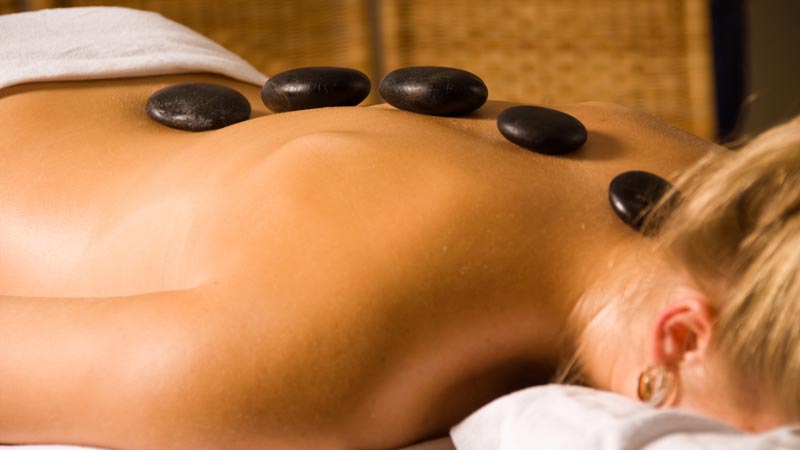 Hot stones steeped in spicy aromatic oils are placed on key energy points of your body. The deep penetrating heat of the stones combined with massage releases muscular tension for a complete and relaxing experience
