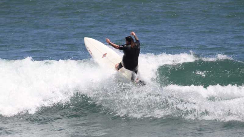 Experience the waves and water with this surfboard and wetsuit rental!