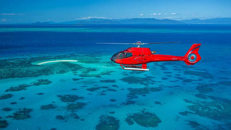 
Enjoy a bird's eye view of the Great Barrier Reef with our most popular scenic flight. Take off with views over Cairns city and surrounding mountains as you head out over the Coral Sea, where the size and majesty of the incredible Great Barrier Reef can only truly be appreciated from the air.